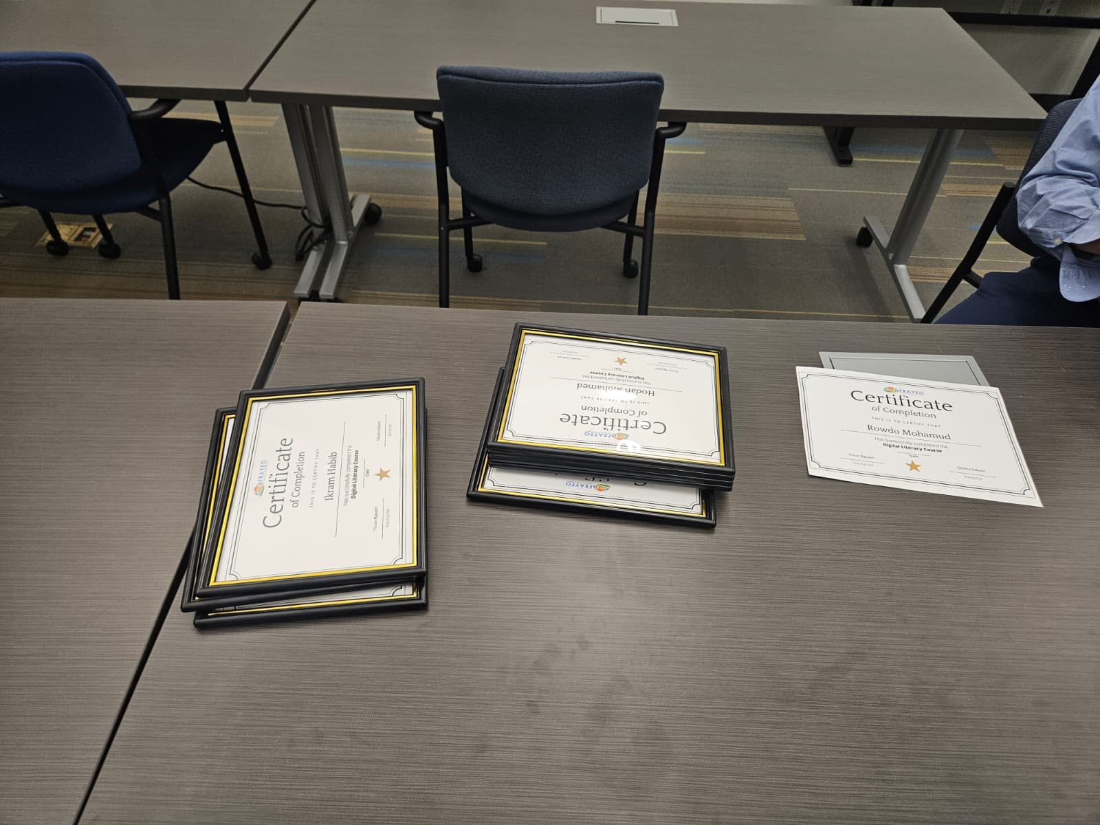Framed Digital Literacy certificates ready for the graduation celebration